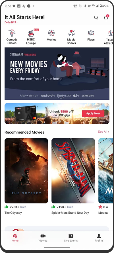 BookMyShow home with Movies emphasized and small event chips at the top